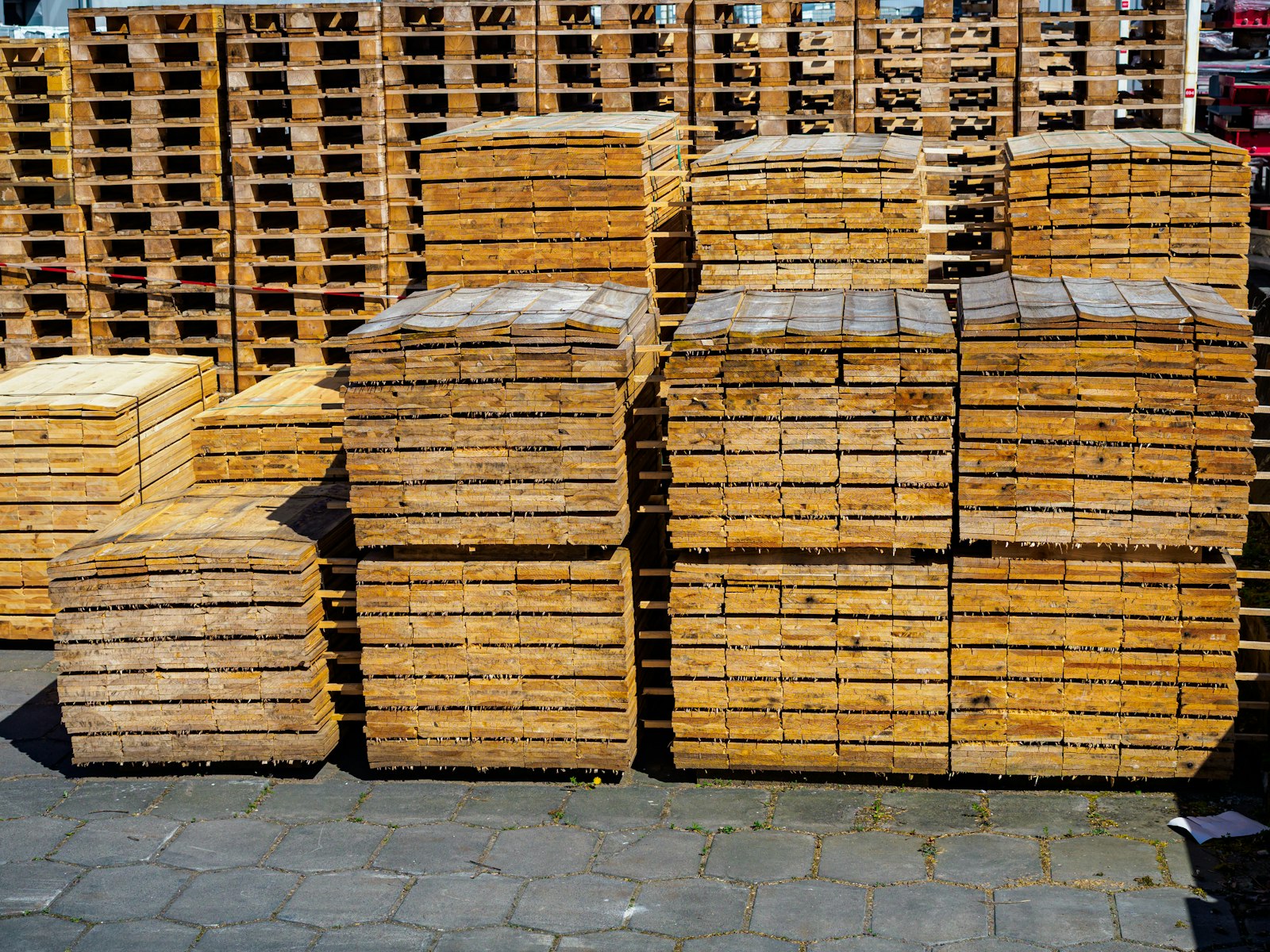 Stacked timber and materials ready to be moved